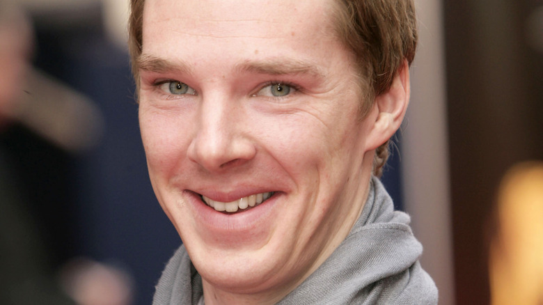 Benedict Cumberbatch wearing a scarf, smiling