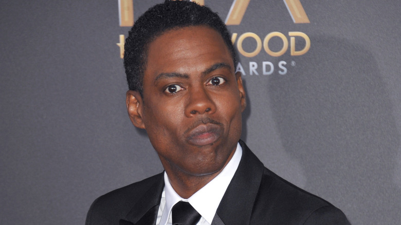 Chris Rock posing