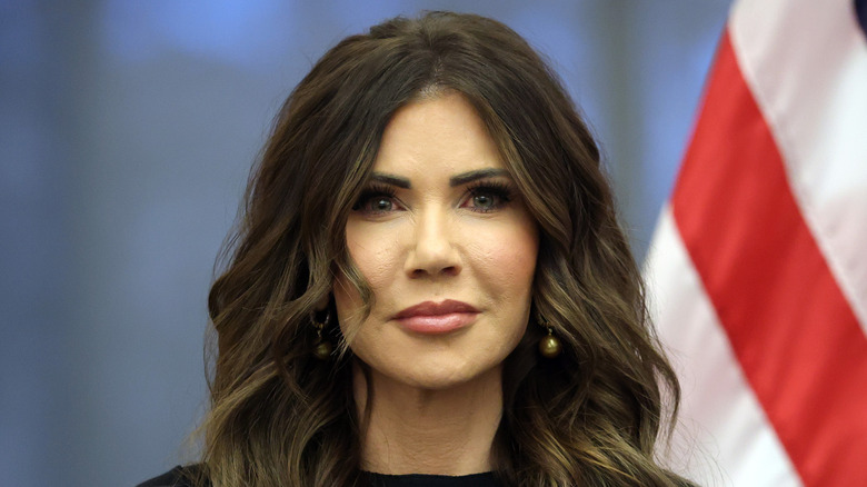 Kristi Noem looking directly into the camera in 2026