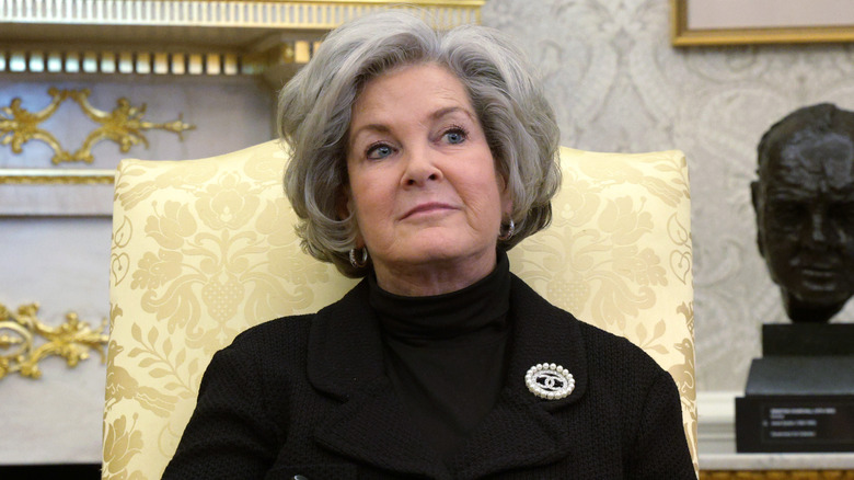 White House Chief of Staff Susie Wiles listening as President Donald Trump announces the creation of the U.S. strategic critical minerals reserve during an event in the Oval Office of the White House