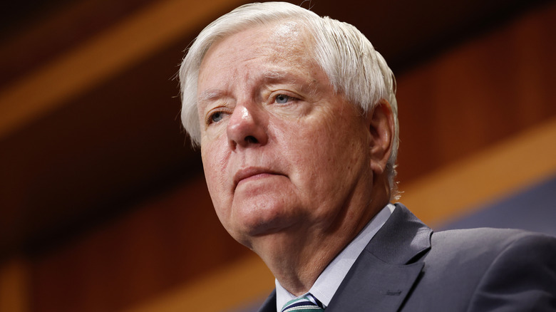 Sen. Lindsey Graham (R-SC) looking on during a news conference at the U.S. Capitol