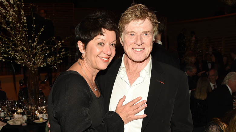 Robert Redford and Sibylle Szaggars posing