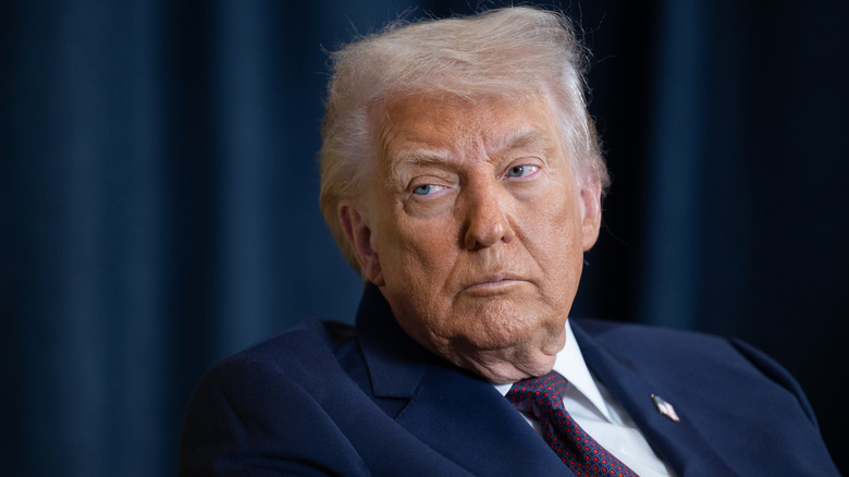 Donald Trump looking to the side in Davos in January 2026.