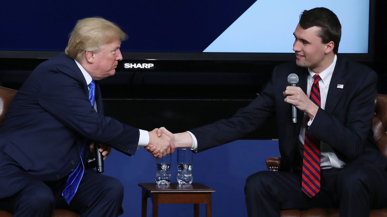 Donald Trump and Charlie Kirk shaking hands