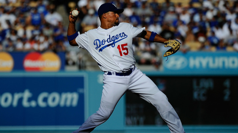 Rafael Furcal throwing a ball on the Los Angeles Dodgers field