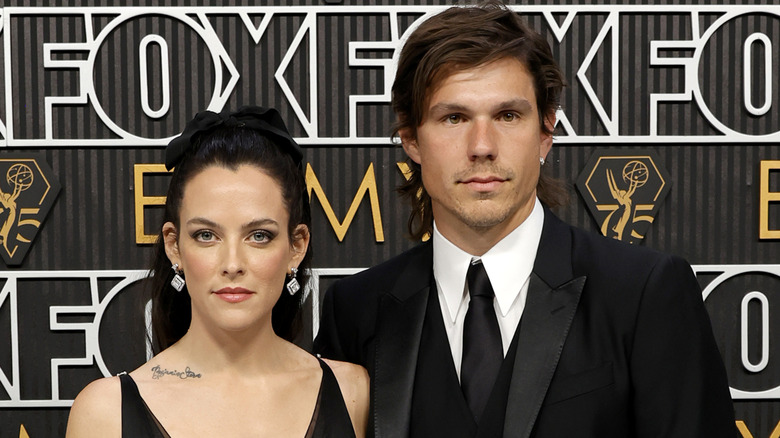 Riley Keough and Ben Smith-Petersen posing