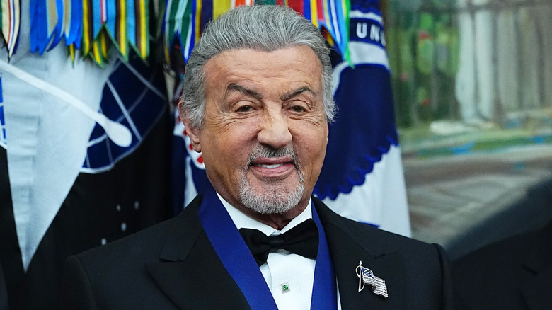 Sylvester Stallone posing at the Kennedy Center Honors.